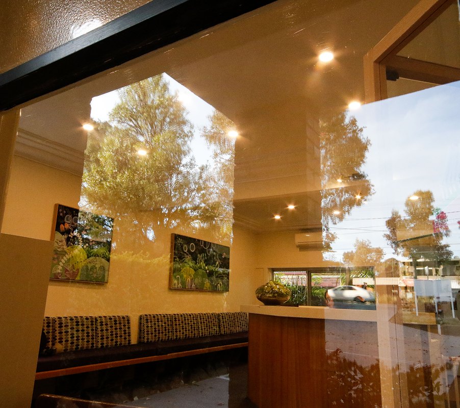 Morning light through the waiting room glass